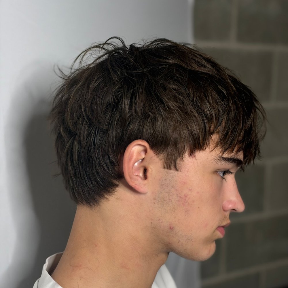 Textured mullet with a fringe, side profile, Hackney Wick